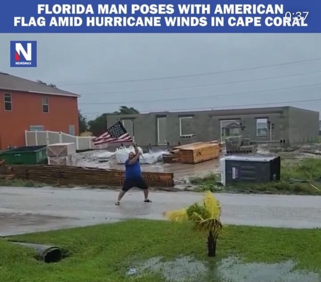 Florida Man Poses With American Flag Amid Hurricane Winds In Cape Coral