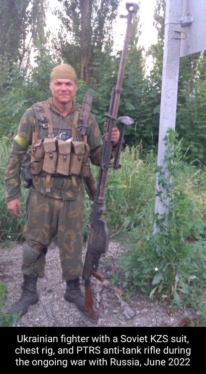 Ukrainian fighter with a Soviet KZS suit, chest rig, and PTRS anti-tank ...
