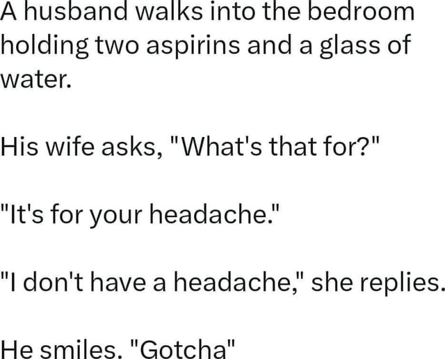 A husband walks into the bedroom holding two aspirins and a glass of