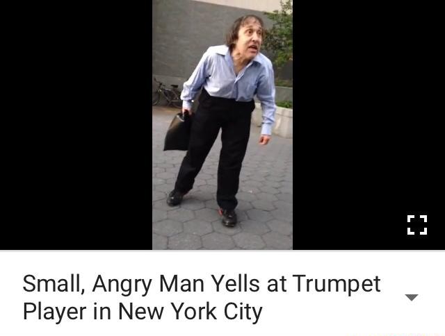 Small Angry Man Yells At Trumpet Player Small, Angry Man Yells at Trumpet Player in New York City - )