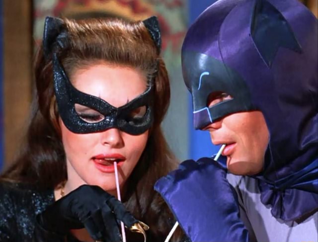 1967: Batman and Catwoman share a beverage on the 