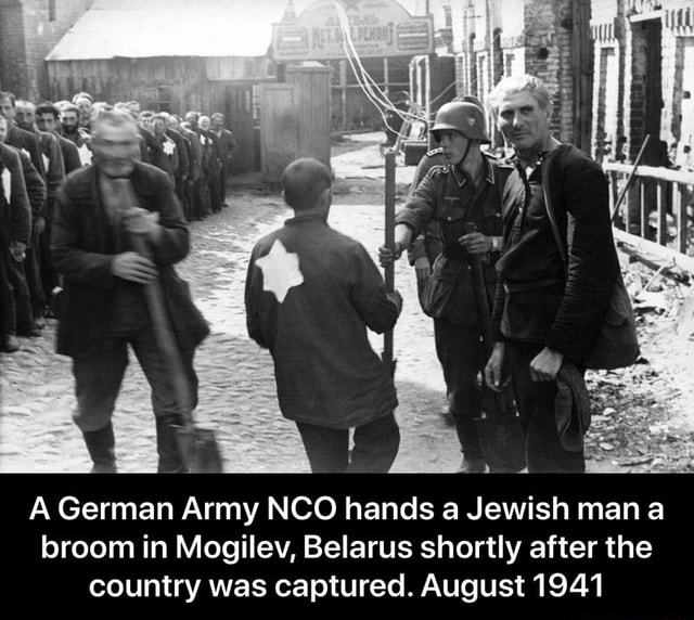 A German Army NCO hands a Jewish man a broom in Mogilev, Belarus ...