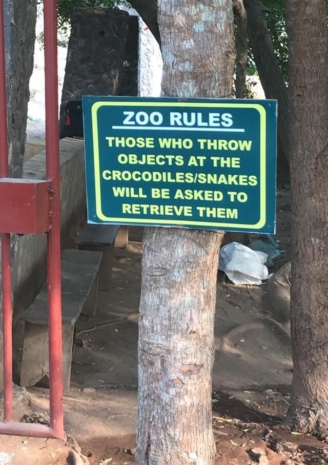 ZOO RULES THOSE WHO THROW OBJECTS AT THE CROCODILESISNAKES WILL BE