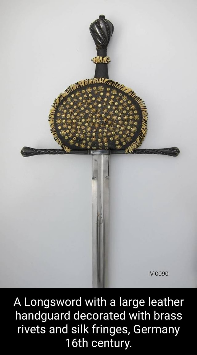 0090 A Longsword with a large leather handguard decorated with brass