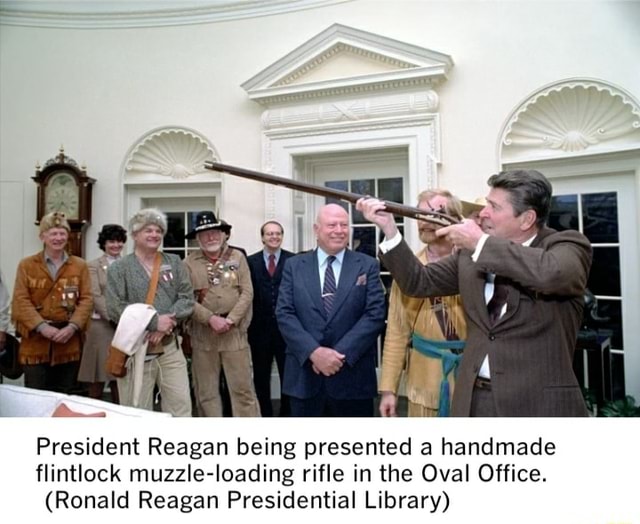 Reagan Rigle President Reagan being presented a handmade flintlock muzzle-loading ...