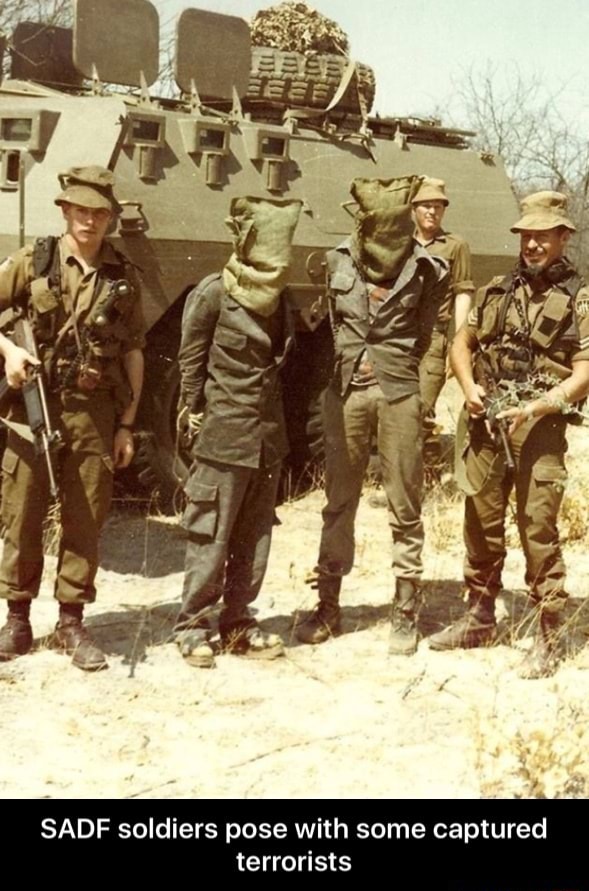 SADF soldiers pose with some captured terrorists - SADF soldiers pose ...