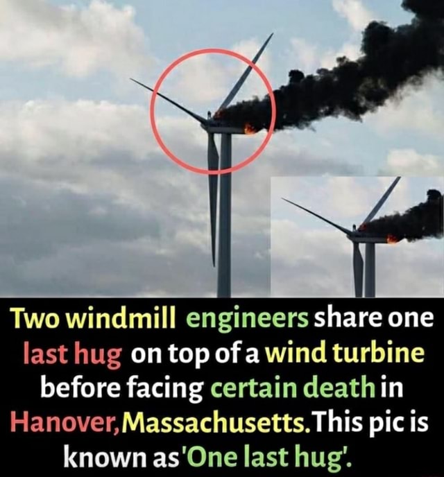 Two Windmill Engineers Share One Last Hug On Top Of A Wind Turbine