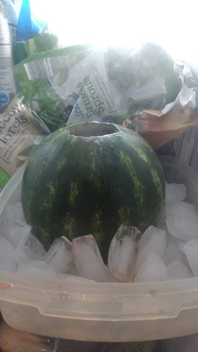 Pulp The Watermelon Interior By Carving A Hole In The Rind And