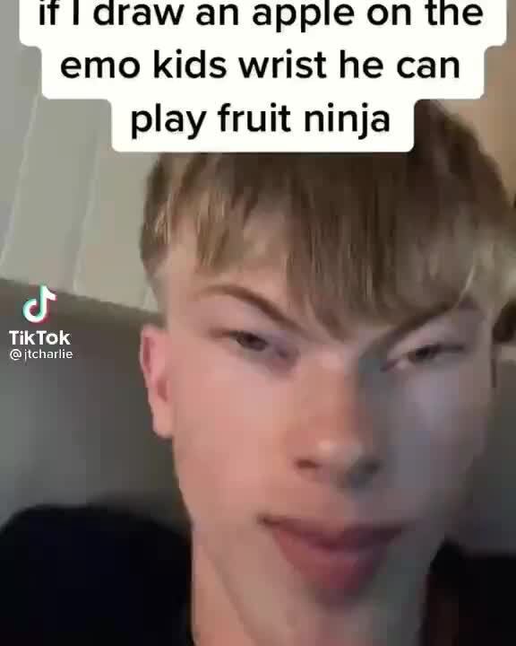 An appie on emo kids wrist he can play fruit ninja TikTok ijtcharlie