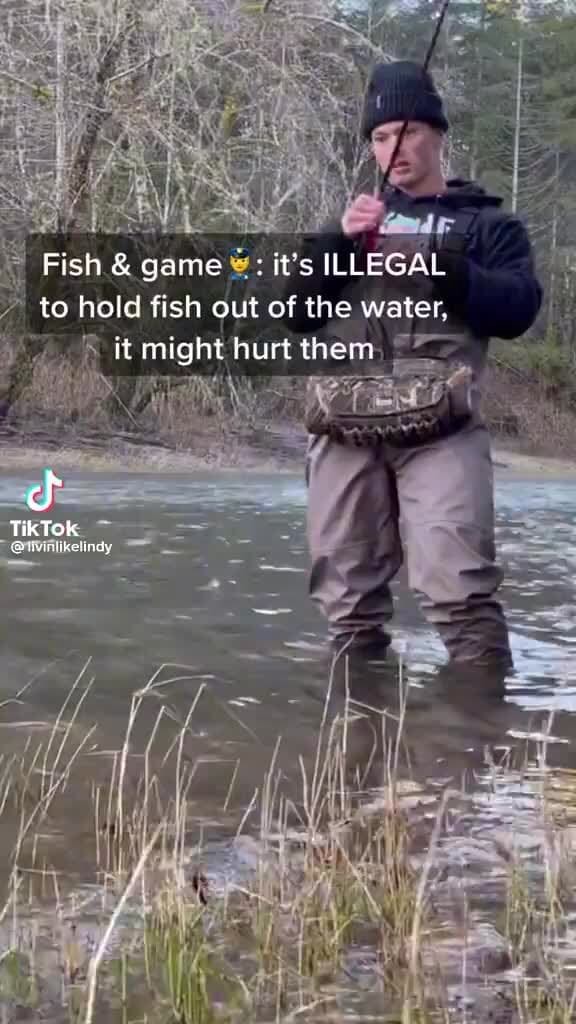 SS Fish & game it's ILLEGAL to hold fish out of the water, it might