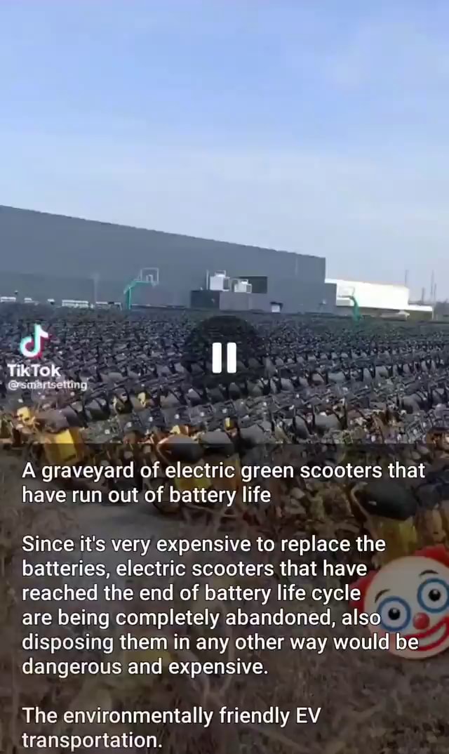 A graveyard of electric green scooters that have run out of battery