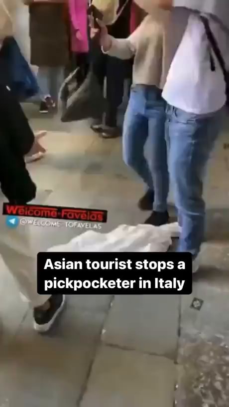 asian tourist stops pickpocket in italy
