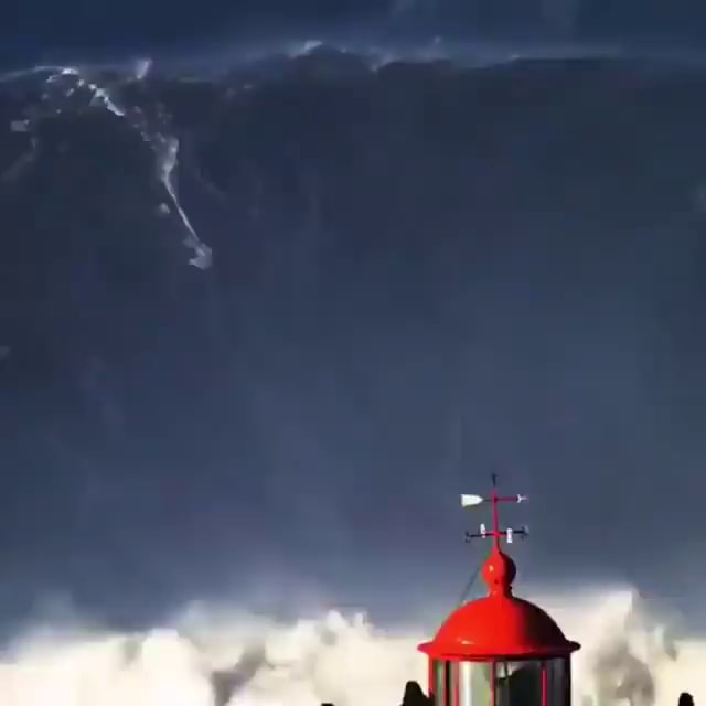 A professional surfing a record 115foot wave in Portugal. Don't try this at home, kiddies. iFunny A professional surfing a record 115foot wave in Portugal. Don't try this at home, kiddies. iFunny