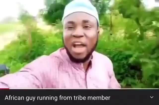 African guy running from tribe member - iFunny